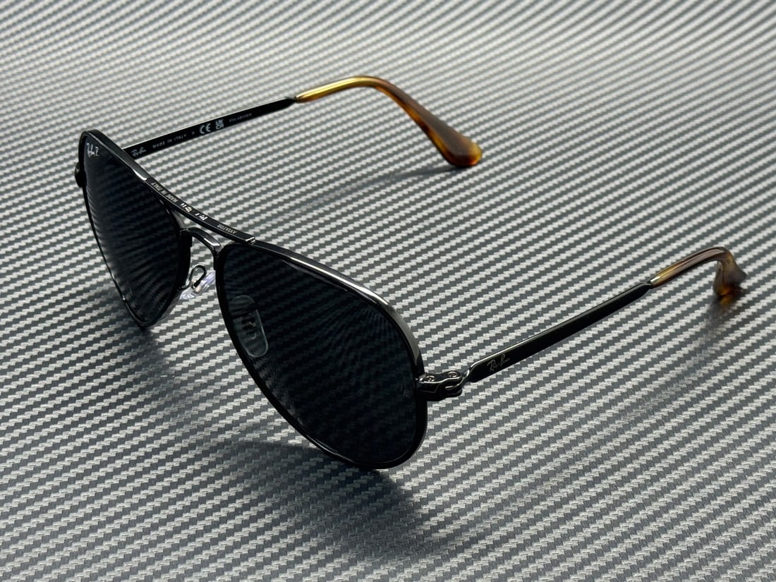 Ray-Ban RB3925 62mm Black Polarized Sunglasses With Case and Cloth: Ray-Ban RB3925 62mm Black Polarized Sunglasses With Case and Cloth These Ray-Ban RB3925 002 48 sunglasses feature a sleek black frame and black polarized lenses, offering both style and glare reductio