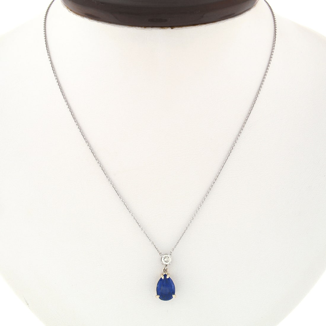 18k Gold GIA Certified 2.62ctw Burma Sapphire Diamond Pendant Necklace: 18k Gold GIA Certified 2.62ctw Burma Sapphire Diamond Pendant Necklace This exquisite necklace features a stunning pear-shaped pendant crafted from solid 18k white gold and a solid 18k yellow gold bas