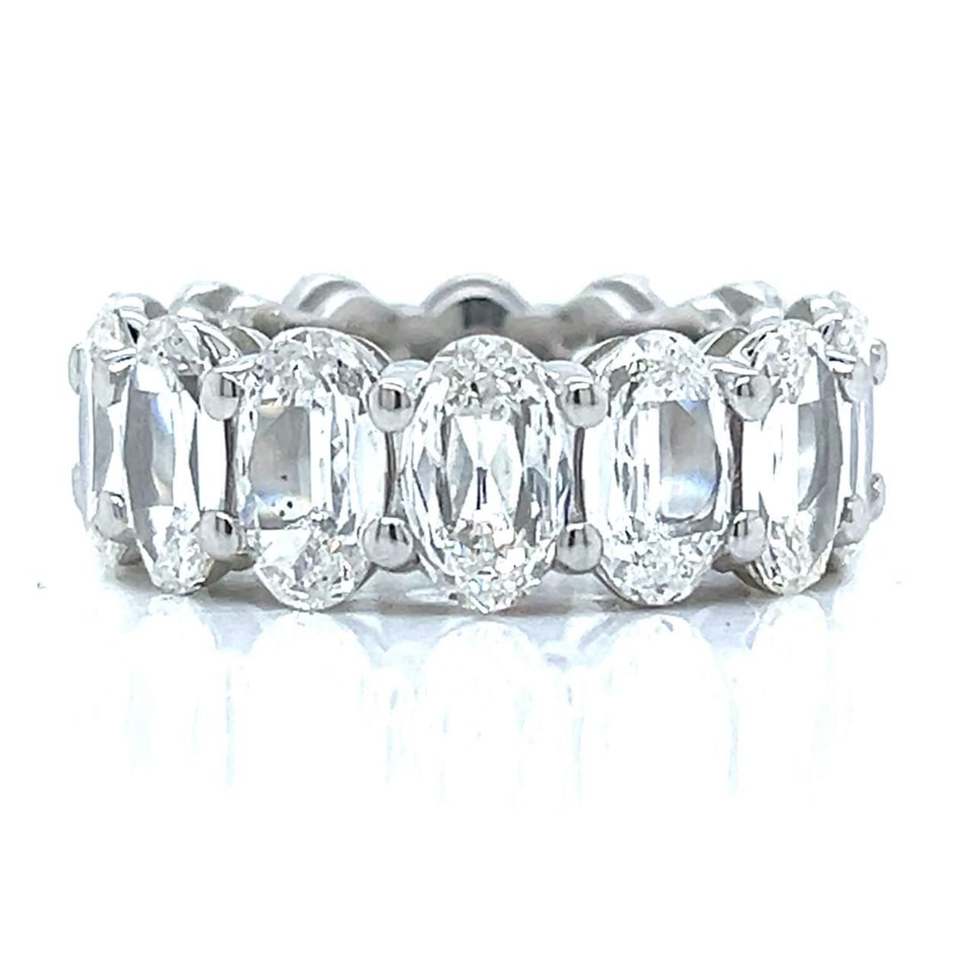 Platinum 11.00 Ct Oval-cut Diamond Eternity Band 14 Stones E-G VS1-VS2: Platinum 11.00 Ct Oval-cut Diamond Eternity Band 14 Stones E-G VS1-VS2 This exquisite eternity band features a stunning collection of 14 oval-cut diamonds, totaling approximately 11.00 carats, set in