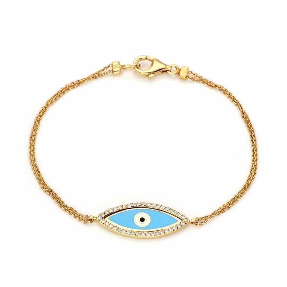 Evil Eye Charm Bracelet in 18k Yellow Gold Diamond and Enamel by Aaron Basha: Evil Eye Charm Bracelet in 18k Yellow Gold Diamond and Enamel by Aaron Basha This Aaron Basha identity-style bracelet is crafted from 18k yellow gold and features a striking evil eye charm adorned wit