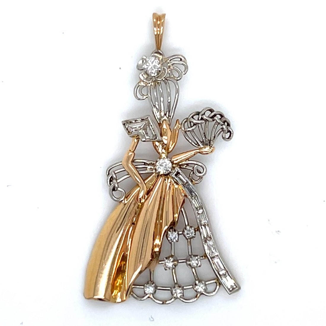 Vintage 18K Gold and Platinum Pendant with 19 Diamonds Circa 1960s: Vintage 18K Gold and Platinum Pendant with 19 Diamonds Circa 1960s This 1960's pendant features elegant 18K yellow gold and platinum, set with 19 diamonds totaling approximately 0.80 carats. The diamo