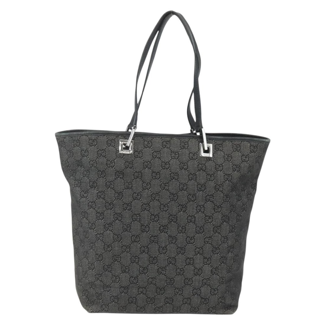 Gucci Vintage GG Canvas Black Bucket Tote Bag: Gucci Vintage GG Canvas Black Bucket Tote Bag This pre-owned Gucci vintage bucket shopping tote is crafted from black canvas and designed for women. It features noticeable signs of use, including surf
