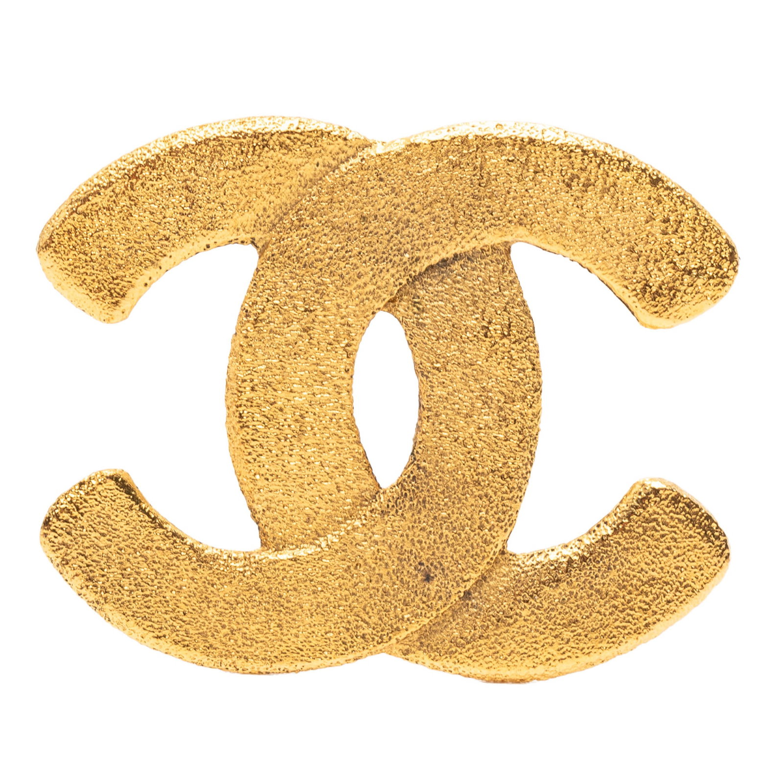 Chanel CC Logo Gold Tone Metal Pin Brooch: Chanel CC Logo Gold Tone Metal Pin Brooch This Chanel brooch features a gold-tone metal body designed in the iconic CC logo motif. It is equipped with a back pin closure for secure fastening. The broo