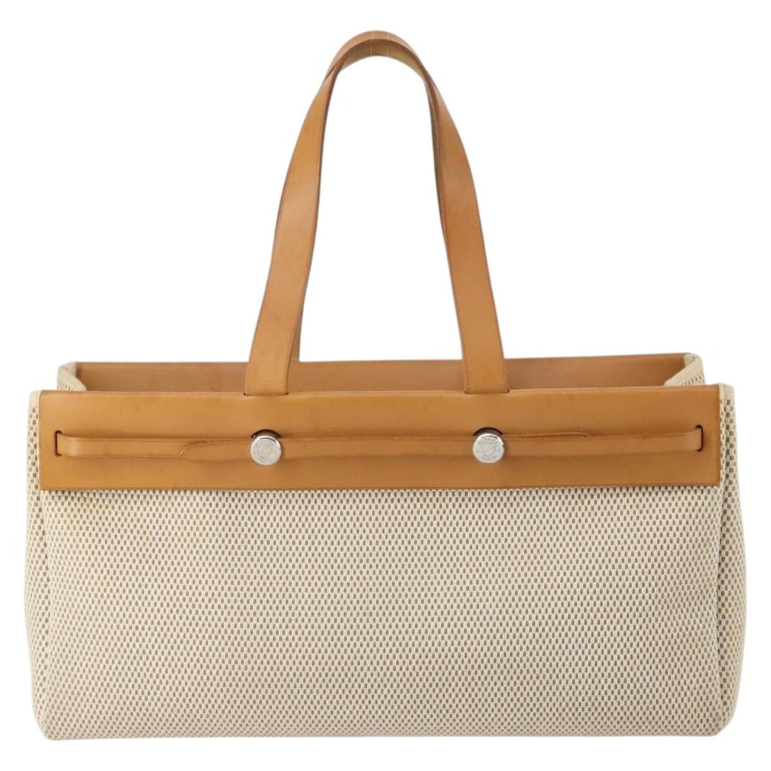 Herbag Cabas Tote Bag by Hermes in Beige Canvas and Leather: Herbag Cabas Tote Bag by Hermes in Beige Canvas and Leather The Hermes Herbag Cabas is a pre-owned women's tote bag crafted from beige canvas with leather accents. It features a spacious design and wa