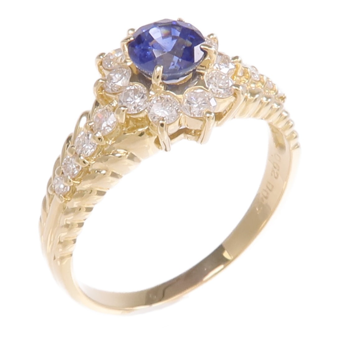 18K Yellow Gold Women's Ring with Sapphire and Diamond US Size 6: 18K Yellow Gold Women's Ring with Sapphire and Diamond US Size 6 This elegant women's ring features a striking blue sapphire as its main stone, accented by diamonds and set in 18K yellow gold. It is d