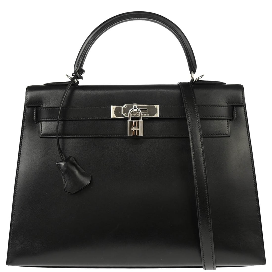 Hermes Kelly 32 Black Box Calf 2-Way Handbag with Silver Hardware: Hermes Kelly 32 Black Box Calf 2-Way Handbag with Silver Hardware Introducing the Hermes Black Box Calf Kelly 32 Sellier 2-way Handbag, a timeless and elegant addition to any collection. This medium-s