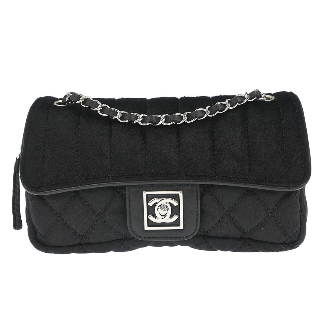 Chanel Sport Line Medium Black Canvas Pony Hair Flap Shoulder Bag: Chanel Sport Line Medium Black Canvas Pony Hair Flap Shoulder Bag This Chanel Sport Line flap shoulder bag features a black pony hair and canvas exterior with a turn lock closure. Designed in a medium