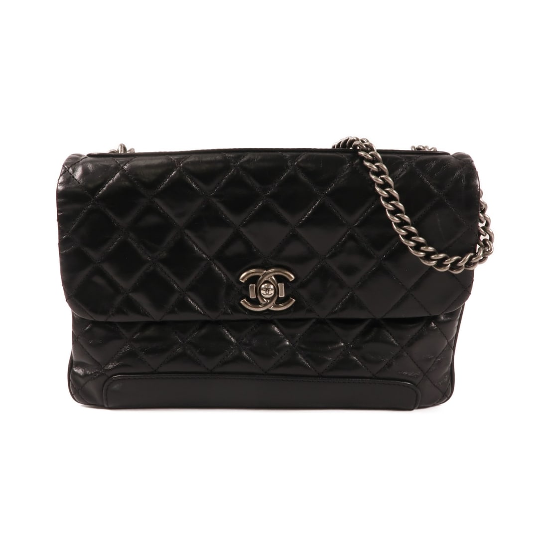 Black Calfskin Chanel Shoulder Bag with Silver Tone Chain CC Logo: Black Calfskin Chanel Shoulder Bag with Silver Tone Chain CC Logo This CHANEL shoulder bag is crafted from black calfskin leather and features the signature CC logo with silver-tone hardware. Designed