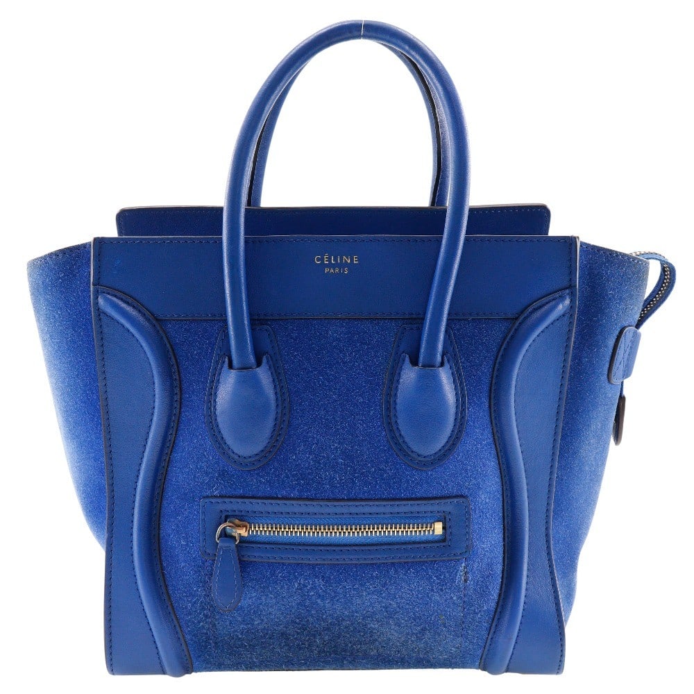 Celine Blue Suede Luggage Bag 26cm Designer Handbag: Celine Blue Suede Luggage Bag 26cm Designer Handbag This Celine Luggage Bag features a blue suede exterior and is designed for women. Crafted in Italy, the bag is noted for its stylish appearance and
