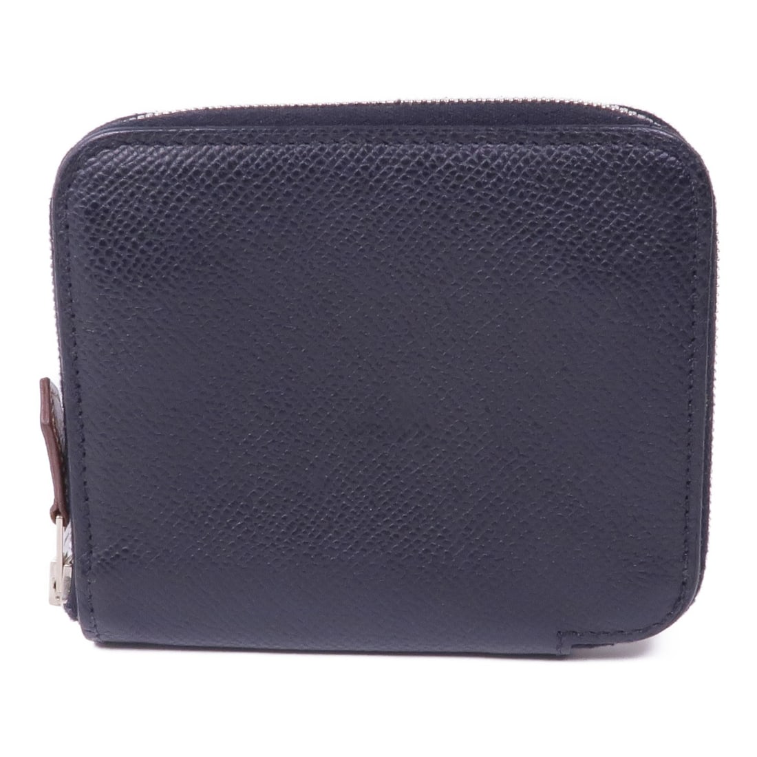 HERMES Silk'In Compact Wallet Black Calfskin PHW Veau Epsom: HERMES Silk'In Compact Wallet Black Calfskin PHW Veau Epsom This stylish round wallet from HERMES is crafted from premium calfskin (cowhide) leather in a classic black color. It showcases a sophistica