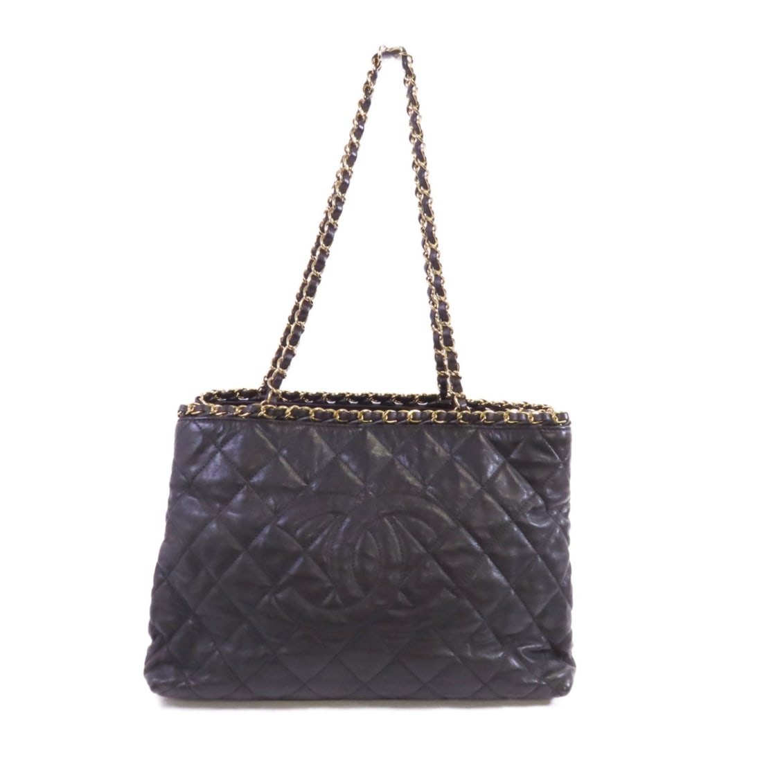 Black Calfskin Chain Around Tote Shoulder Bag by CHANEL with Gold Hardware: Black Calfskin Chain Around Tote Shoulder Bag by CHANEL with Gold Hardware This Chanel Chain Around Tote shoulder bag is crafted from black calfskin leather, offering a sophisticated and timeless look