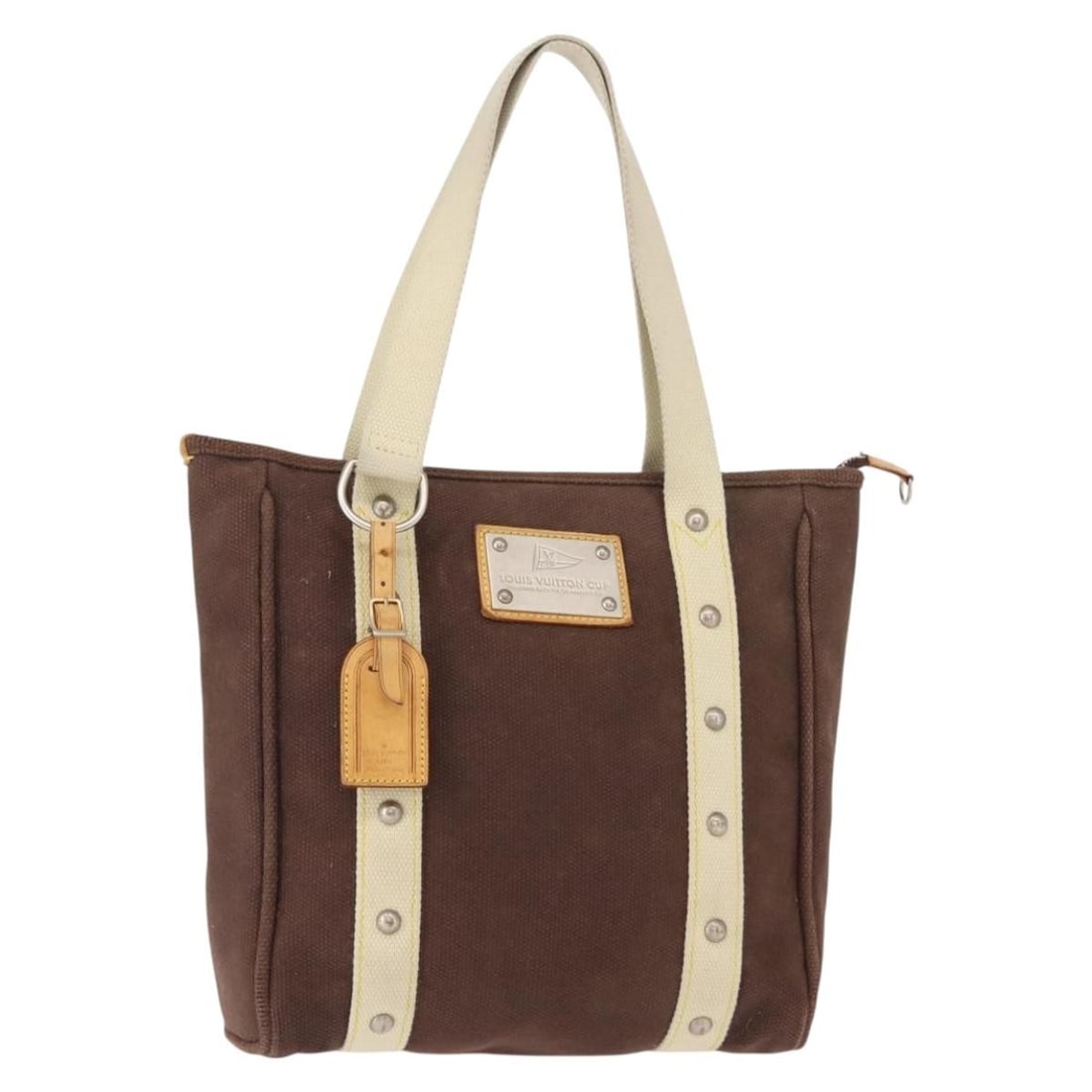 Antigua Tote Bag by Louis Vuitton in Brown Canvas 29cm x 30cm: Antigua Tote Bag by Louis Vuitton in Brown Canvas 29cm x 30cm This Louis Vuitton Antigua Tote is crafted from brown canvas and designed for women. The bag displays signs of use including surface defor