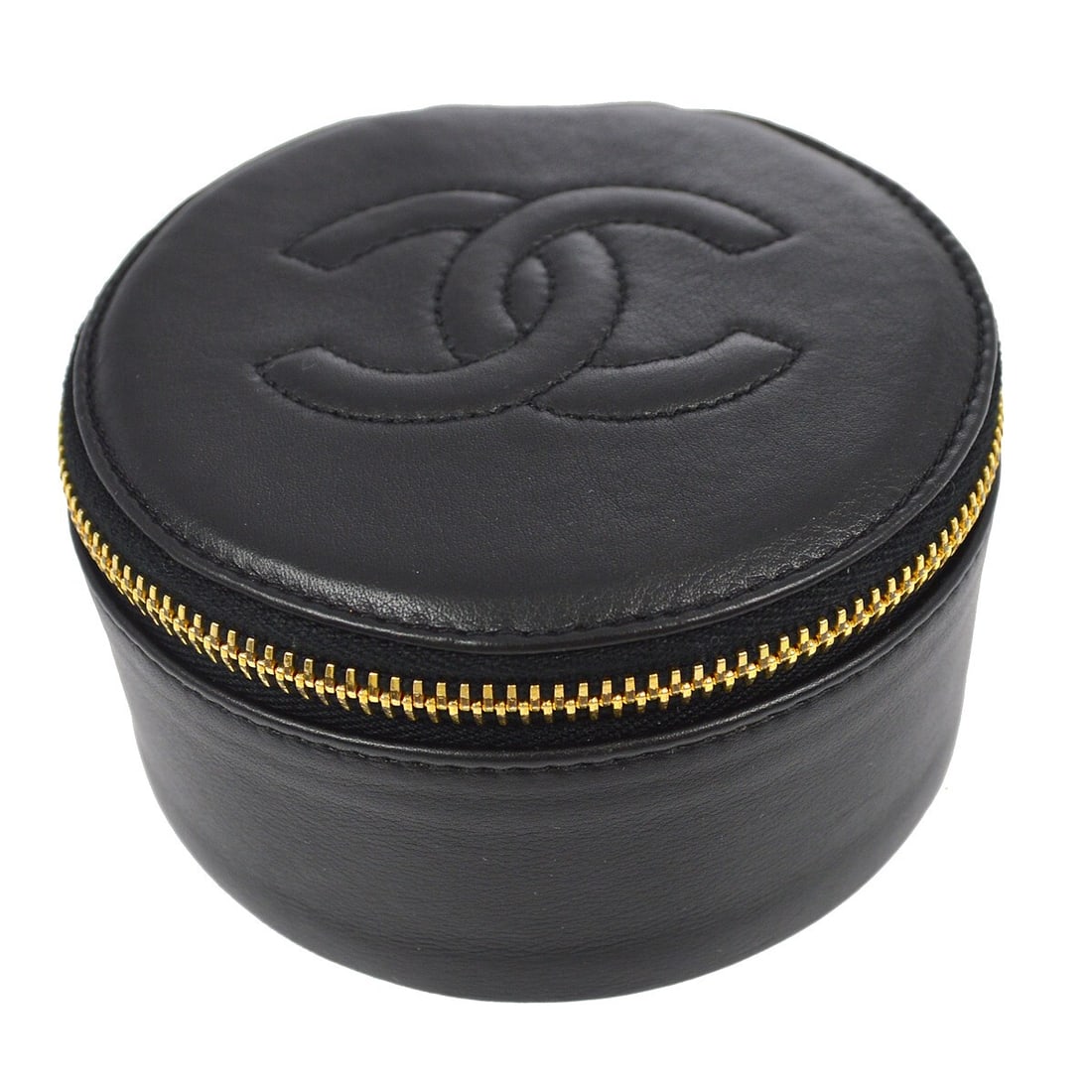 Chanel Vintage Black Lambskin Round Jewelry Case Pouch: Chanel Vintage Black Lambskin Round Jewelry Case Pouch This exquisite Chanel Jewelry Case Pouch is crafted from luxurious black lambskin, showcasing a round shape that exudes elegance. As a vintage pi