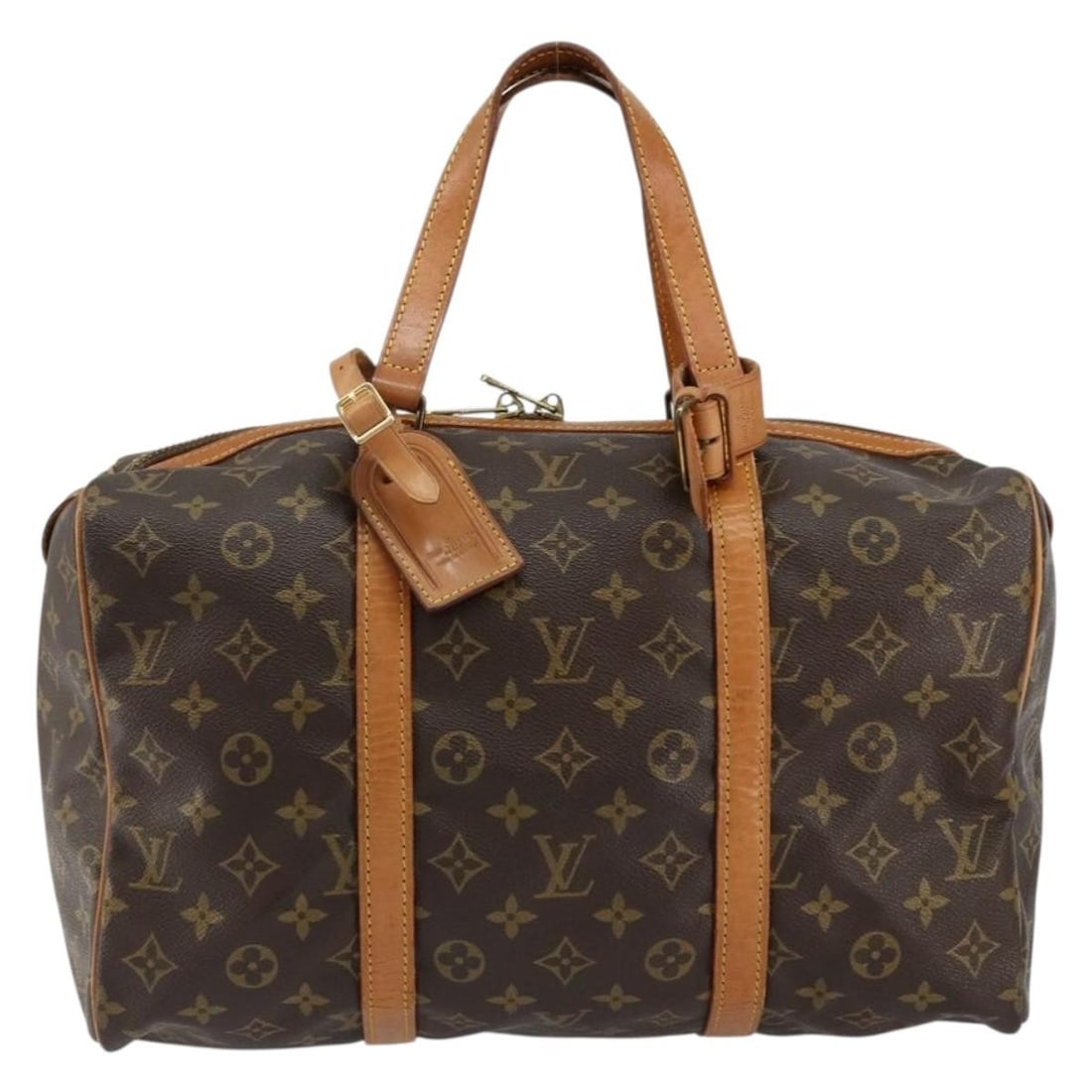 Louis Vuitton Monogram Canvas Sac Souple Unisex Handbag Brown: Louis Vuitton Monogram Canvas Sac Souple Unisex Handbag Brown This Louis Vuitton Sac Souple handbag features the signature monogram canvas in brown. Designed for unisex use, the bag is crafted from hi