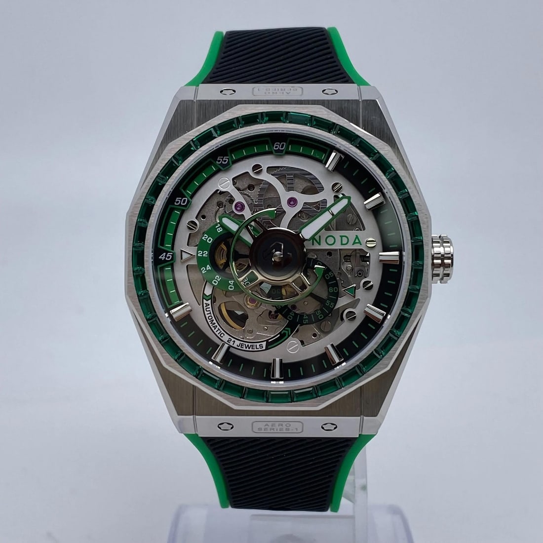 Aero Series-1 Green Skeleton Dial 43mm Automatic Stainless Steel Wristwatch: Aero Series-1 Green Skeleton Dial 43mm Automatic Stainless Steel Wristwatch The Noda Aero Series-1 is an un-used luxury automatic wristwatch featuring a 43 mm brushed stainless steel octagon case with