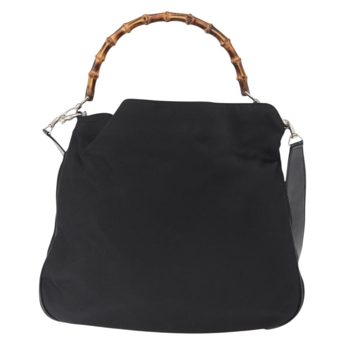 Gucci Black Nylon Vintage Bamboo Handle Tote Bag Italy: Gucci Black Nylon Vintage Bamboo Handle Tote Bag Italy This Gucci Vintage Bamboo Handle Bag is crafted from black nylon and features iconic bamboo handles. Designed for women, it offers a spacious int