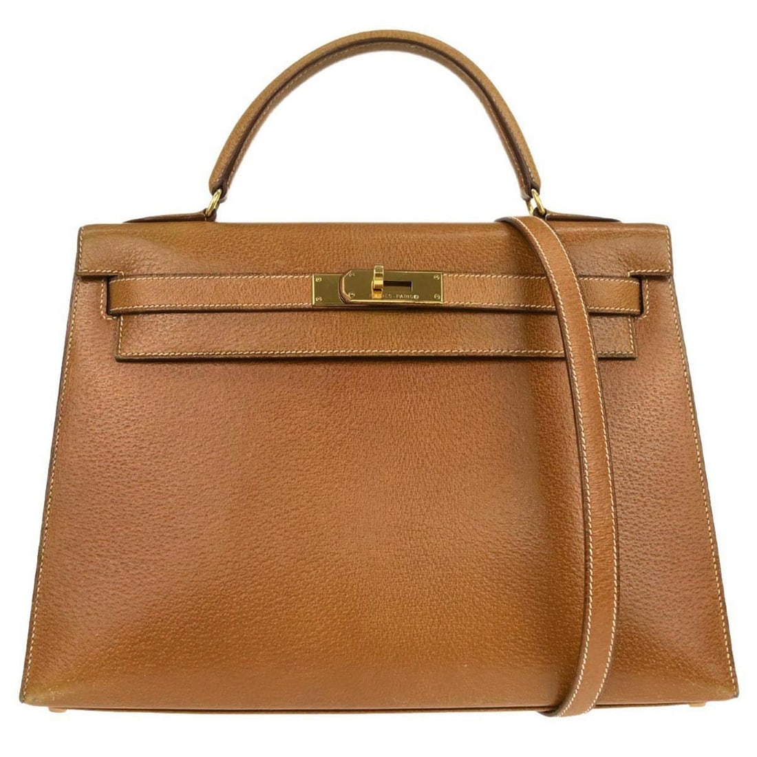 Hermes Kelly 32 Sellier Gold Leather Top Handle Bag with Detachable Strap: Hermes Kelly 32 Sellier Gold Leather Top Handle Bag with Detachable Strap The Hermes Kelly 32 Sellier handbag features natural pigskin leather in a gold color, accented by a turn lock flap closure. Th