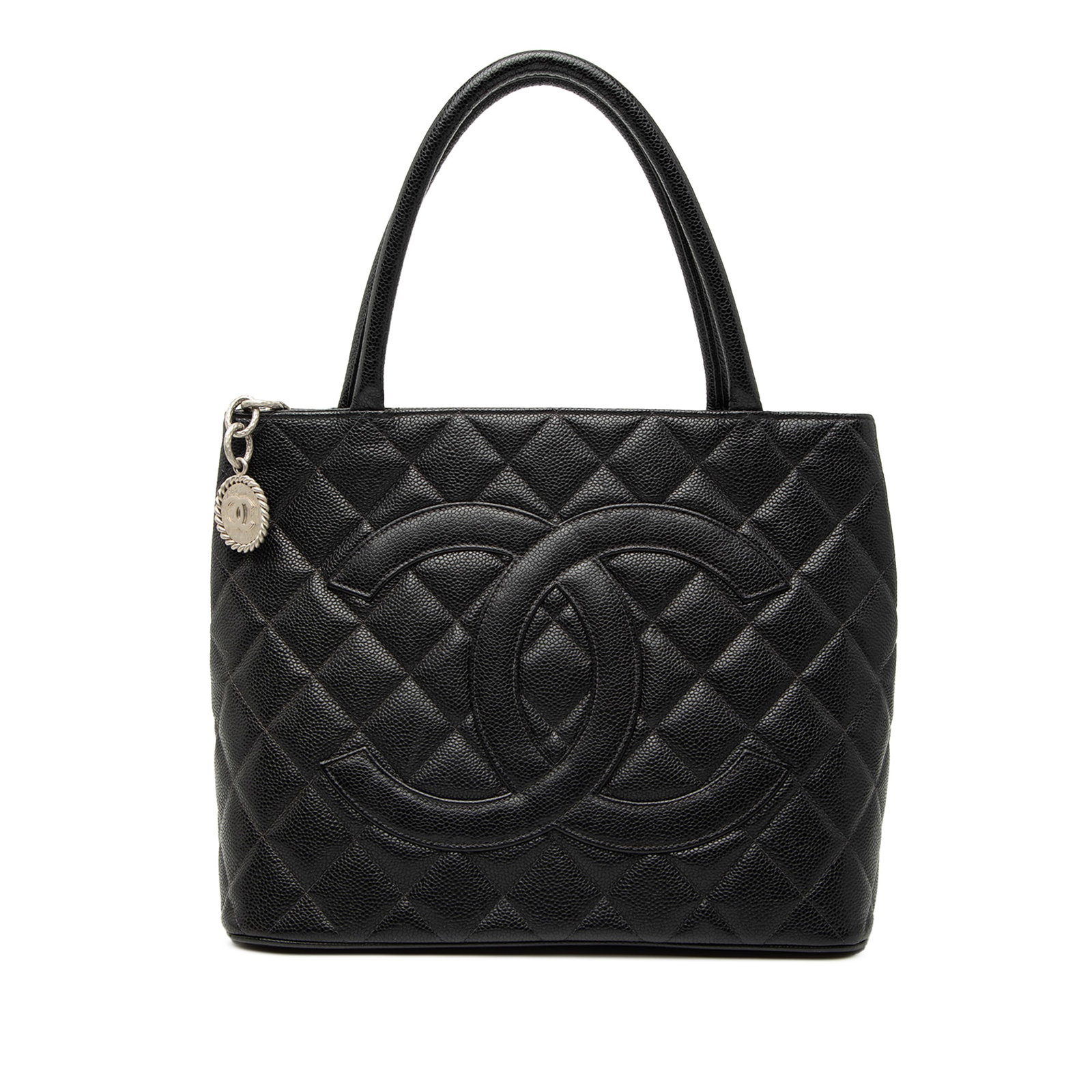Chanel Black Quilted Caviar Leather Medallion Tote Bag with Rolled Handles: Chanel Black Quilted Caviar Leather Medallion Tote Bag with Rolled Handles This Chanel Caviar Medallion Tote features a quilted caviar leather body in black, rolled leather handles, a top zip closure,