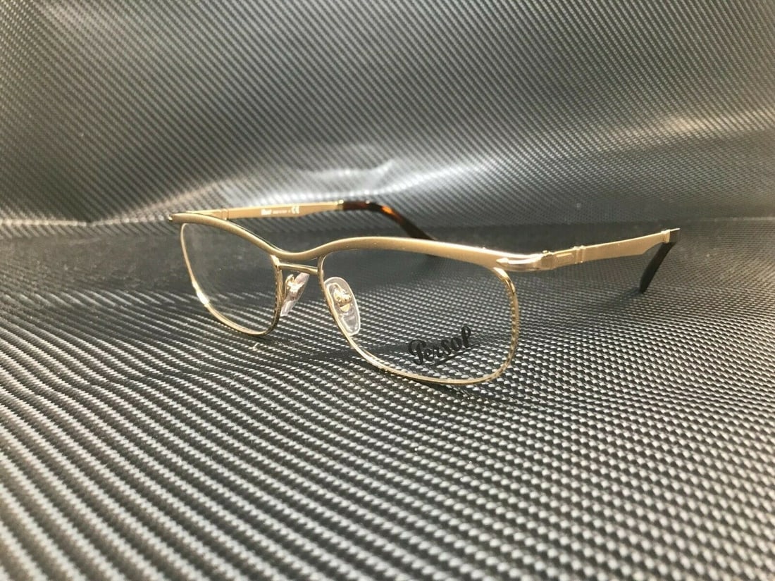 Persol PO2464V 1076 Gold Rectangle Unisex Eyeglasses with Authenticity: Persol PO2464V 1076 Gold Rectangle Unisex Eyeglasses with Authenticity Elevate your eyewear collection with these Persol PO2464V 1076 eyeglasses. Featuring a chic rectangle style, these unisex eyeglas