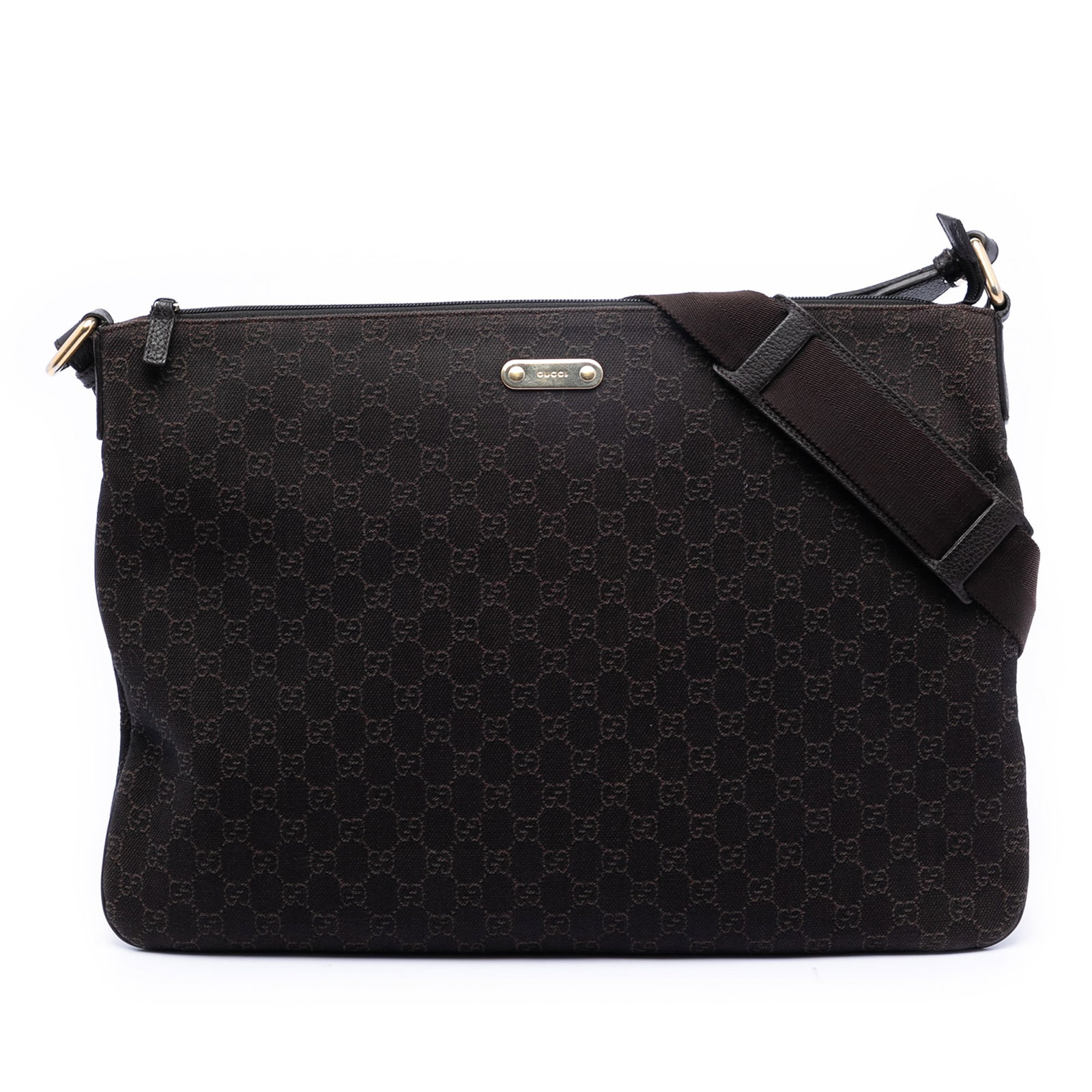 Gucci GG Denim Brown Fabric Crossbody Bag from Italy: Gucci GG Denim Brown Fabric Crossbody Bag from Italy This Gucci GG Denim Crossbody bag features a brown denim fabric body with a flat strap, top zip closure, and interior zip and slip pockets. Made in