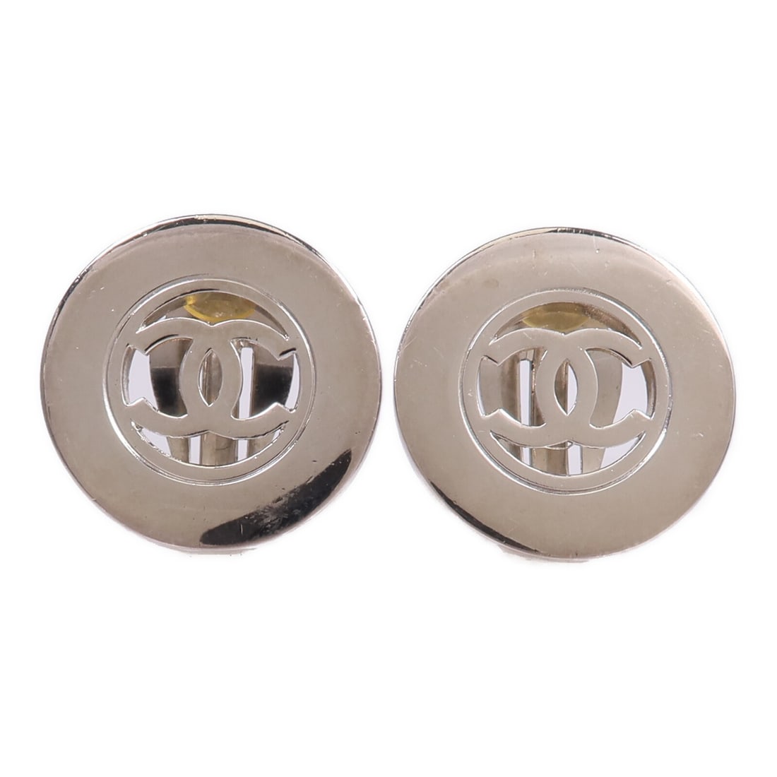 Chanel Silver Tone CC Logo Vintage Earrings for Women: Chanel Silver Tone CC Logo Vintage Earrings for Women These CHANEL CC vintage earrings feature a classic silver tone, crafted for women's wear. Made in France, these earrings present a timeless design