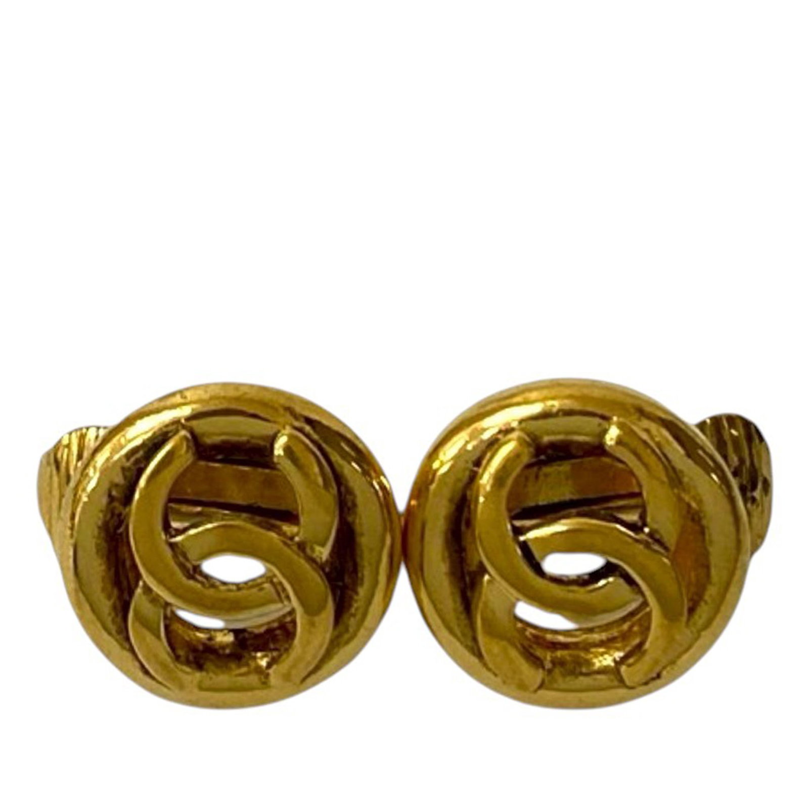 Chanel CC Logo Gold Plated Metal Clip On Round Earrings: Chanel CC Logo Gold Plated Metal Clip On Round Earrings These Chanel CC earrings feature gold plated metal bodies with round, clip-on closures. The design is from France and falls under the costume je