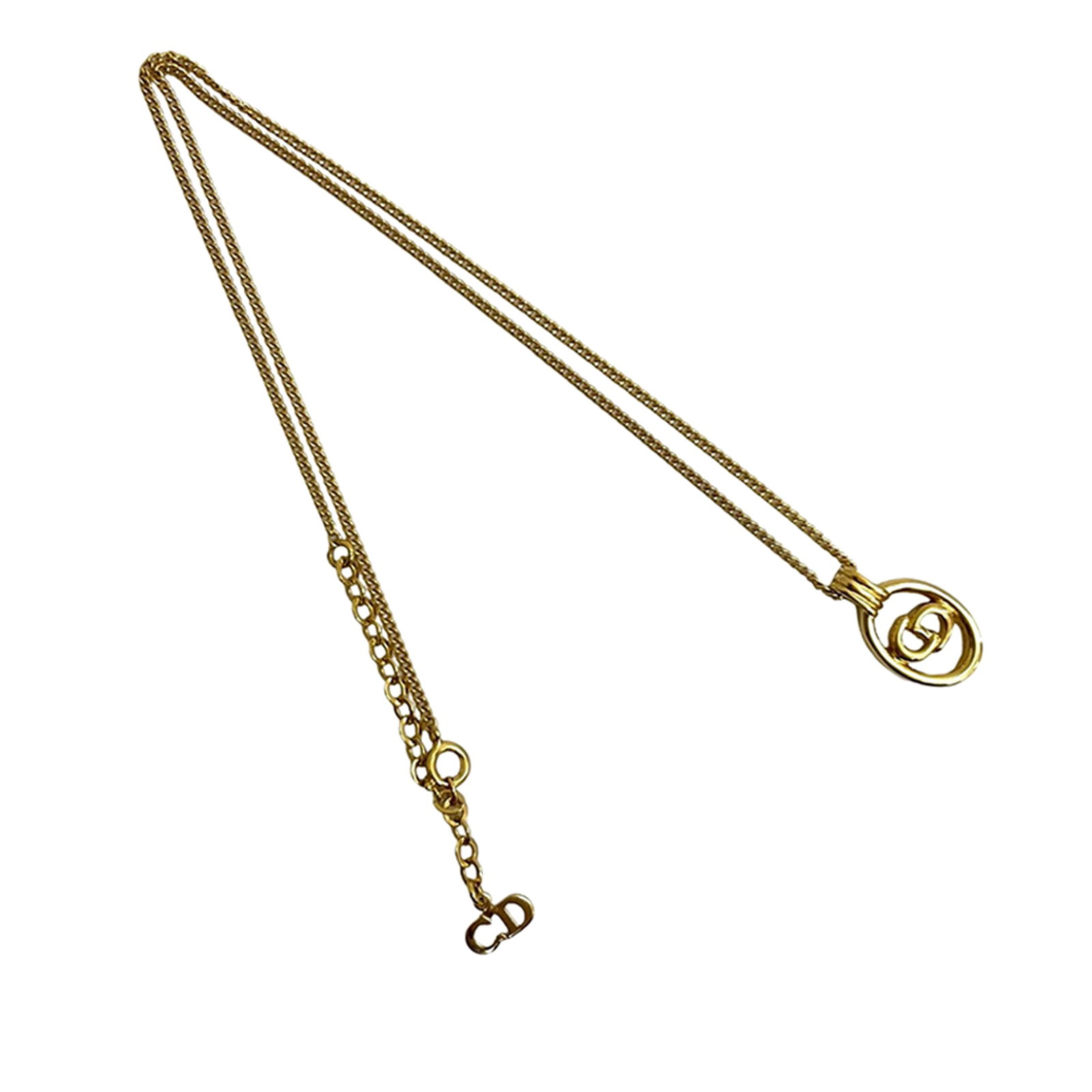Dior Costume Necklace with Gold Plated CD Logo Pendant: Dior Costume Necklace with Gold Plated CD Logo Pendant This Dior necklace features a gold plated metal body with a distinctive CD logo pendant and a spring ring closure. It originates from France and