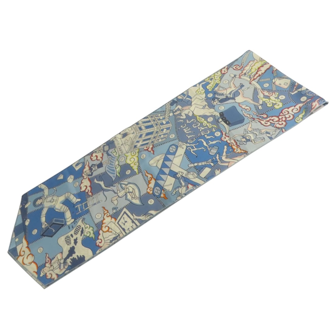 Silk Maxi Twilly Blue Multicolor Scarf by Hermes: Silk Maxi Twilly Blue Multicolor Scarf by Hermes This Hermes Maxi Twilly scarf features a vibrant multicolor design on blue silk. Crafted in France, it offers a luxurious touch and versatile style for