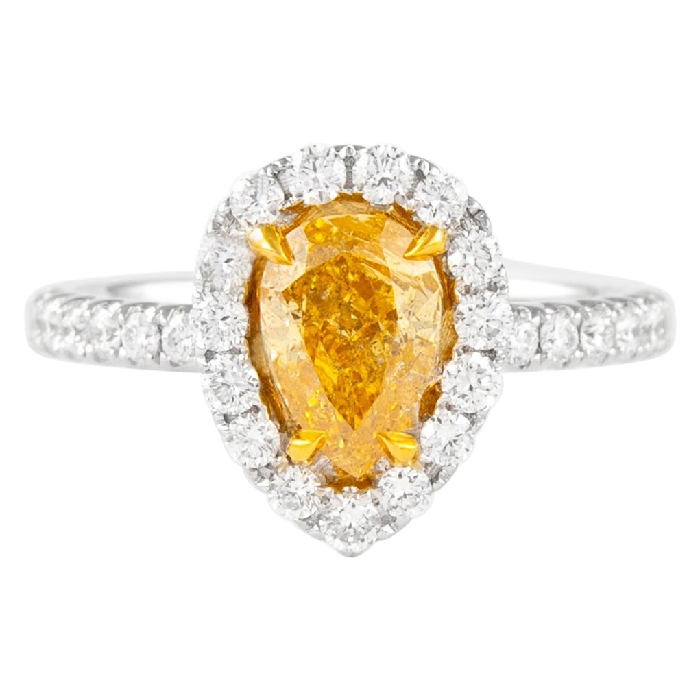 GIA Fancy Intense Orange-Yellow Diamond Ring 1.03ct: GIA Fancy Intense Orange-Yellow Diamond Ring 1.03ct Presenting a stunning GIA certified Fancy Intense Orange-Yellow Pear Diamond Ring, showcasing a total diamond weight of 1.60 carats. This contempora