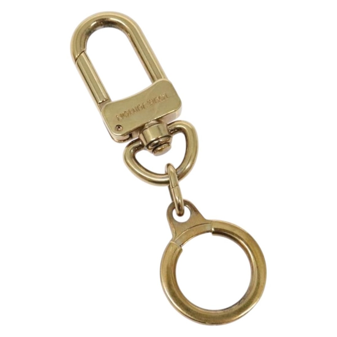 Louis Vuitton Metal Bolt Keychain Pochette Extender Gold Tone: Louis Vuitton Metal Bolt Keychain Pochette Extender Gold Tone Louis Vuitton Bolt Pochette Extender Keychain in gold metal, designed for unisex use. It features a length of 8 cm and originates from Fra