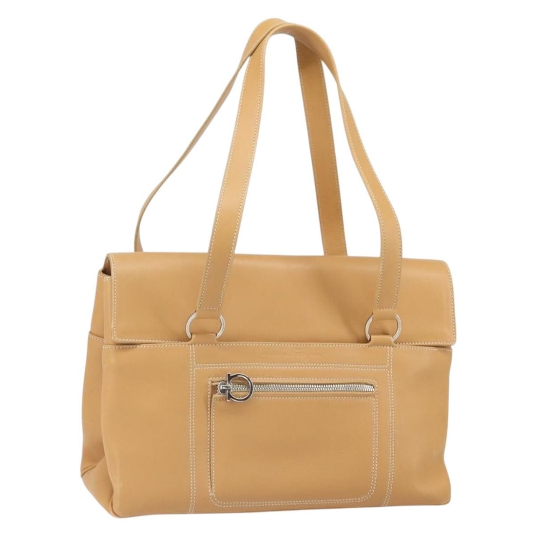 Beige Leather Tote by Salvatore Ferragamo Silver Accents Made in Italy: Beige Leather Tote by Salvatore Ferragamo Silver Accents Made in Italy This Salvatore Ferragamo tote bag features a beige and silver leather exterior with silver-tone metal fittings. The bag is crafte