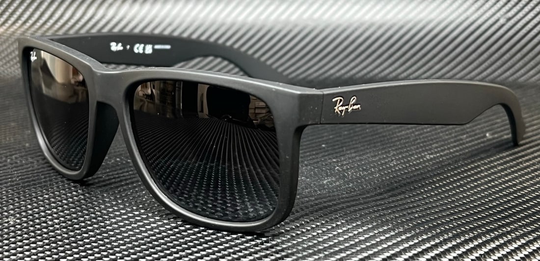 Ray-Ban RB4165 601 8G Matte Black Gray Gradient Sunglasses: Ray-Ban RB4165 601 8G Matte Black Gray Gradient Sunglasses Experience stylish eye protection with these Ray-Ban RB4165 601 8G sunglasses. Designed for men, these sunglasses feature a sleek matte black