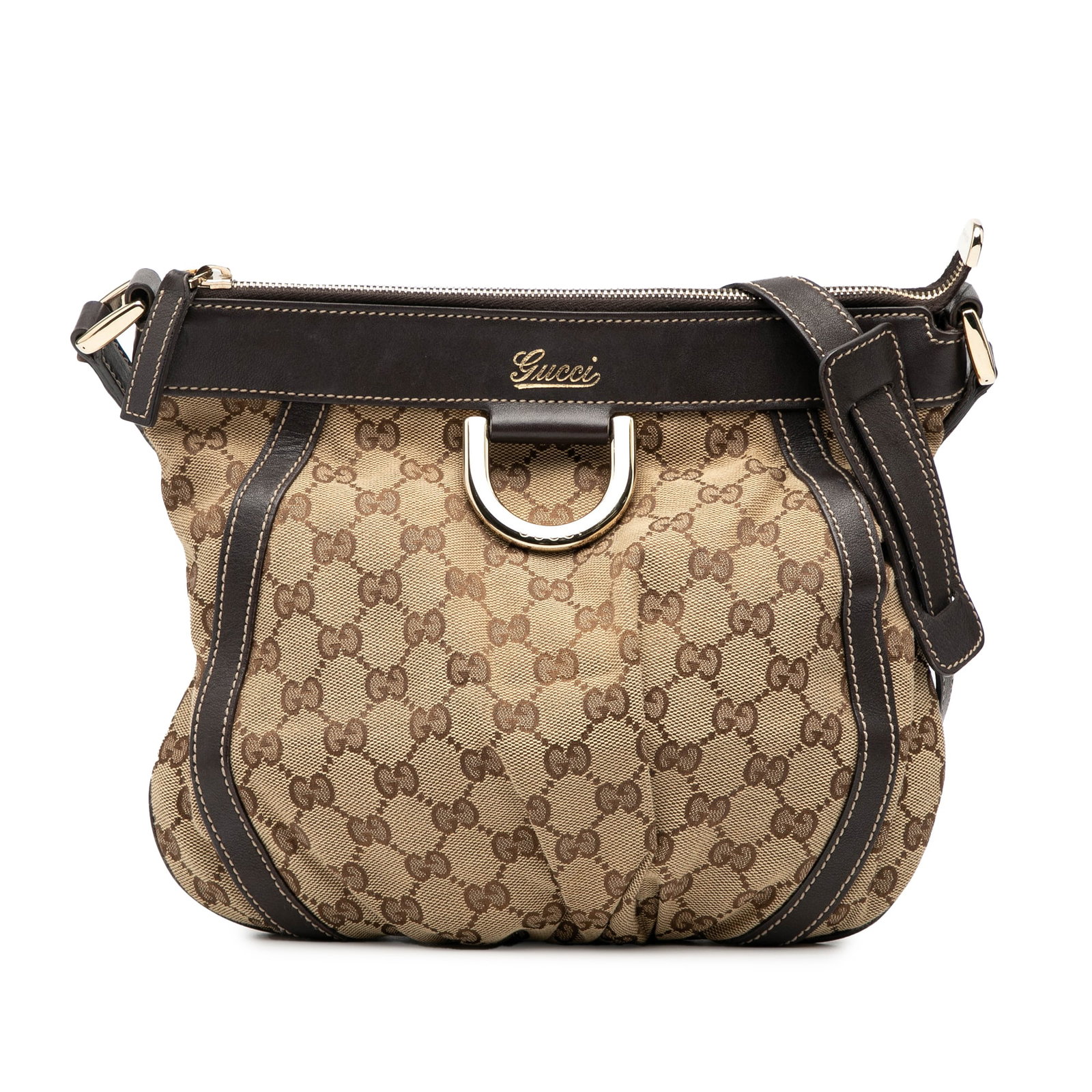 GG Canvas Abbey D Ring Brown Crossbody Bag by Gucci: GG Canvas Abbey D Ring Brown Crossbody Bag by Gucci The Gucci GG Canvas Abbey D Ring Crossbody is crafted with a durable canvas body accented by leather trim. It features an adjustable flat leather sh