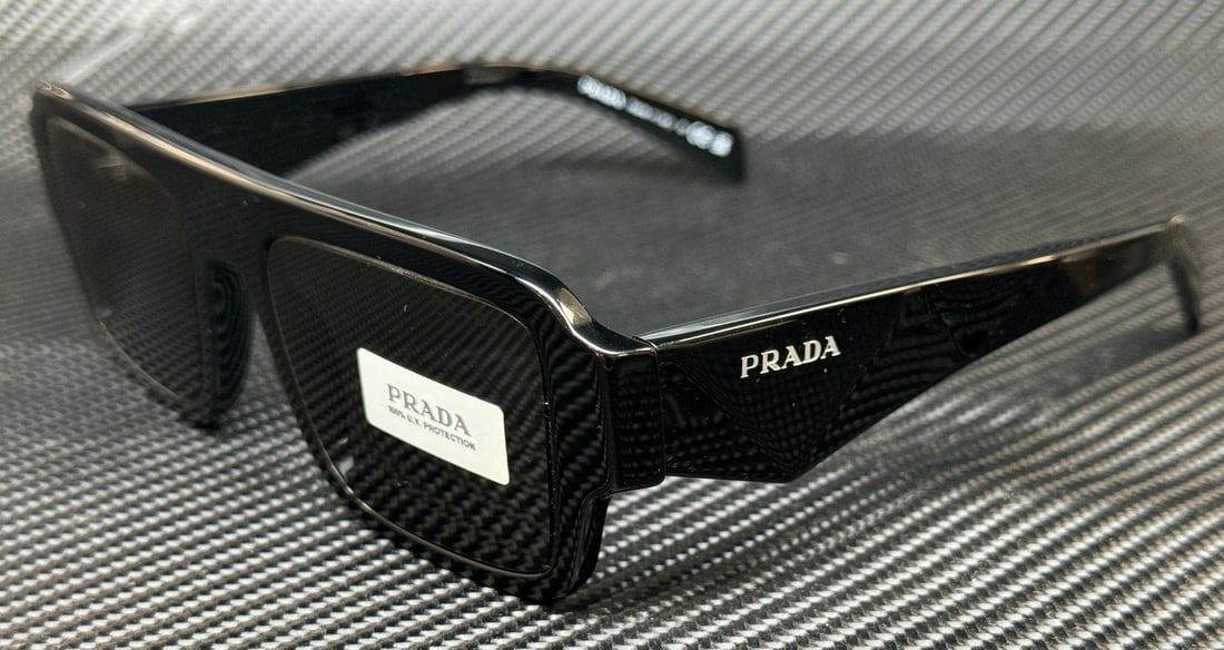 PRADA PR A05S 16K08Z Black Grey Men's Sunglasses with Authenticity Certificate: PRADA PR A05S 16K08Z Black Grey Men's Sunglasses with Authenticity Certificate Elevate your eyewear collection with these stylish PRADA sunglasses. Featuring a striking black frame that complements da