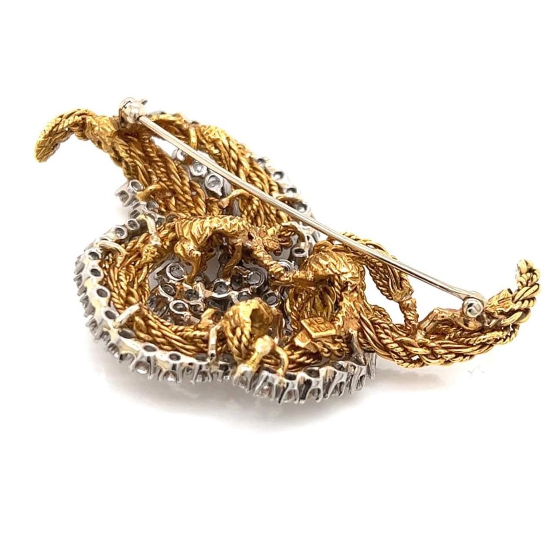 Elegant 18K Yellow Gold Platinum 7.50 Ct Diamond Brooch: Elegant 18K Yellow Gold Platinum 7.50 Ct Diamond Brooch This exquisite brooch features a stunning combination of 18K yellow gold and platinum, elegantly set with 66 diamonds totaling approximately 7.5