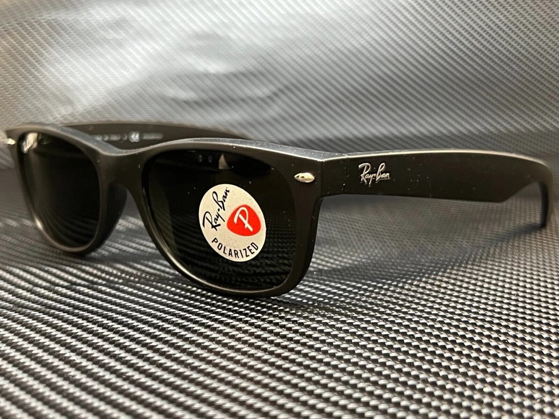 Ray-Ban RB2132 622 58 Black Wayfarer Sunglasses Polarized Green Lens: Ray-Ban RB2132 622 58 Black Wayfarer Sunglasses Polarized Green Lens Discover the iconic Ray-Ban RB2132 sunglasses, designed for both style and functionality. These unisex wayfarer sunglasses feature