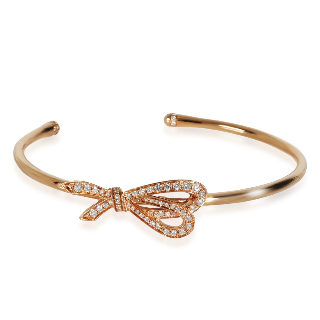 Tiffany & Co. Bow Bracelet 18k Rose Gold 0.82 CTW Unisex: Tiffany & Co. Bow Bracelet 18k Rose Gold 0.82 CTW Unisex This exquisite Tiffany & Co. Bow Bracelet is crafted from luxurious 18k rose gold, featuring a total carat weight of 0.82 CTW with round brilli