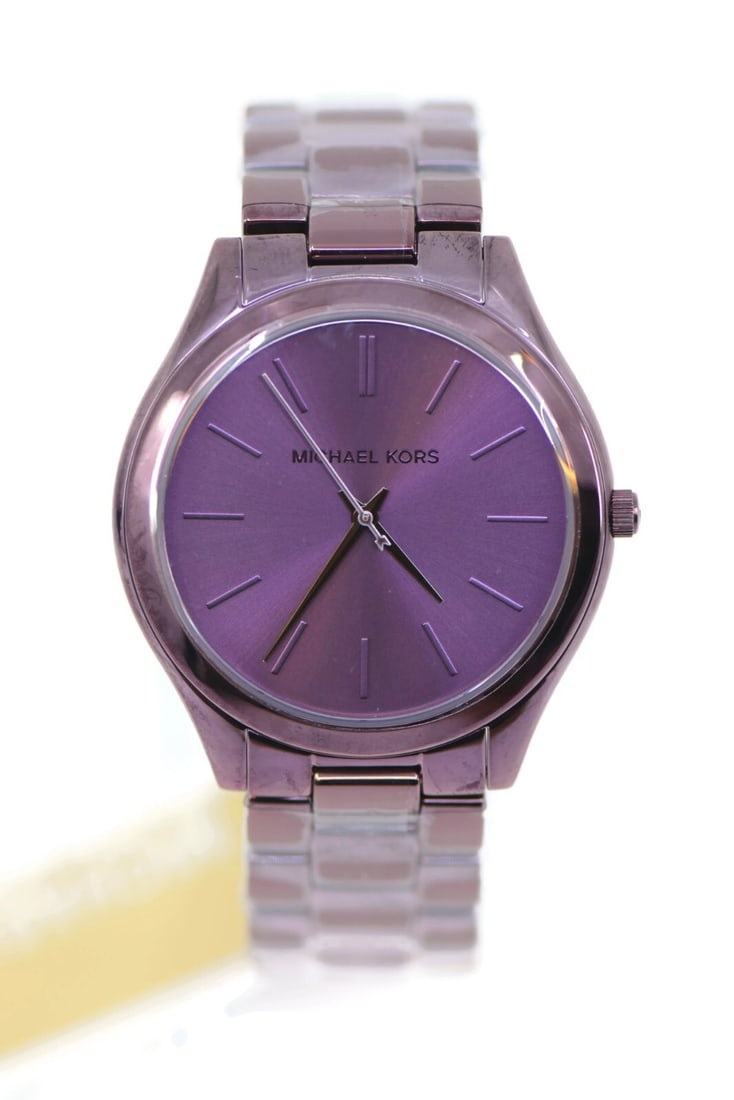 Michael Kors Slim Runway MK4415 Stainless Steel Quartz Watch with Purple Dial: Michael Kors Slim Runway MK4415 Stainless Steel Quartz Watch with Purple Dial This Michael Kors Slim Runway watch combines elegance and functionality, featuring a striking purple dial housed in a dura