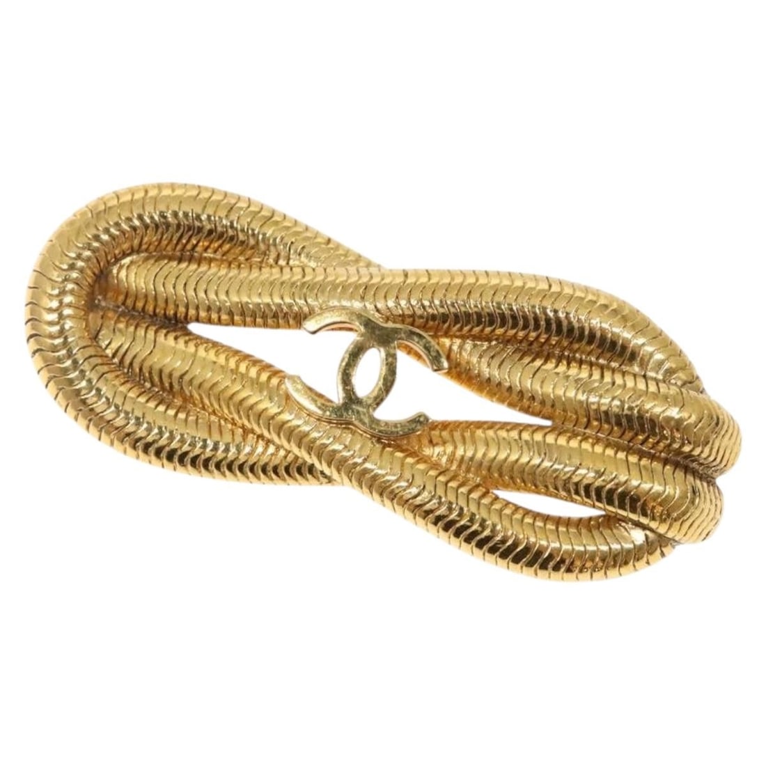 CHANEL Gold CC Logo Brooch Made in France Authentic: CHANEL Gold CC Logo Brooch Made in France Authentic This exquisite CHANEL brooch showcases a striking gold metal design, embodying the luxury and elegance synonymous with the brand. Crafted in France,