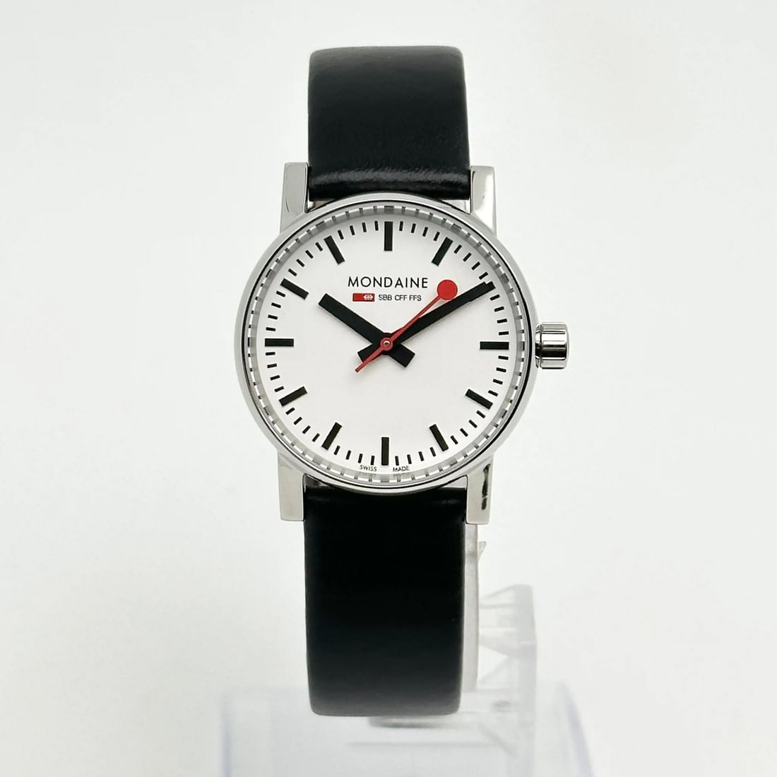 Mondaine Evo 2 Ladies Quartz Watch Steel Case White Dial Leather Band: Mondaine Evo 2 Ladies Quartz Watch Steel Case White Dial Leather Band The Mondaine Evo 2 Steel Quartz Watch is a stylish and practical timepiece designed for women. Featuring a classic round case made