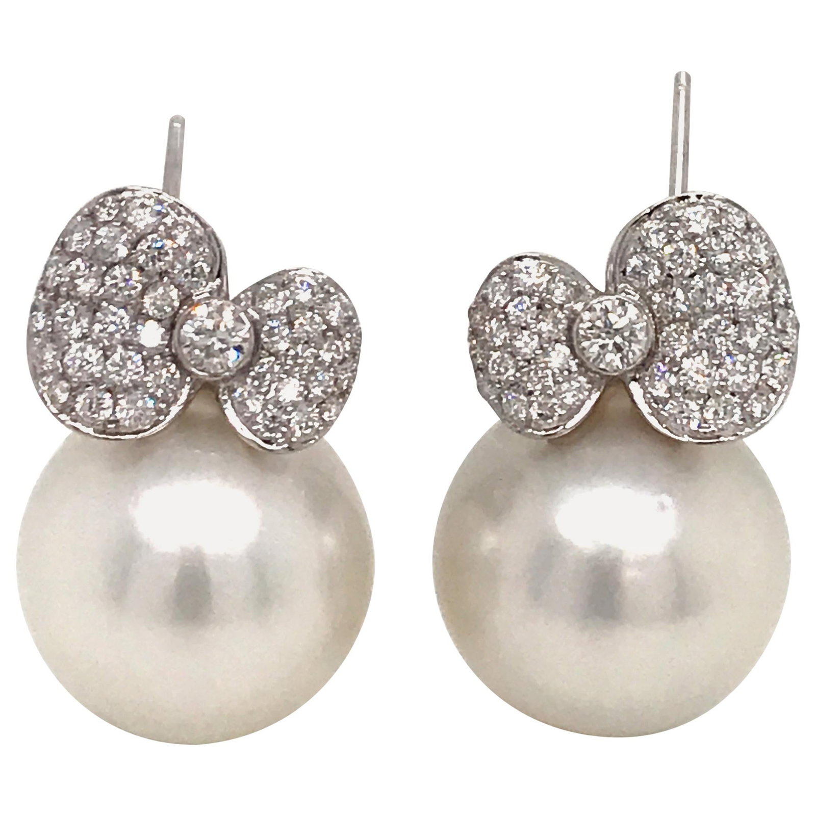 Harbor Diamonds 18K White Gold South Sea Pearl Diamond Bow Earrings: Harbor Diamonds 18K White Gold South Sea Pearl Diamond Bow Earrings Elevate your elegance with these stunning South Sea Pearl Diamond Bow Drop Earrings. Crafted in luxurious 18K white gold, these earr