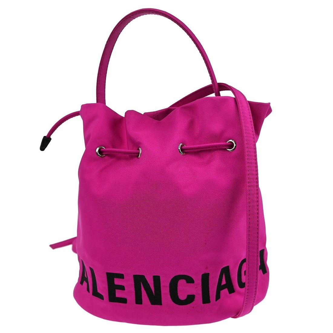 Balenciaga Wheel XS Petal Pink Nylon Drawstring Shoulder Bag: Balenciaga Wheel XS Petal Pink Nylon Drawstring Shoulder Bag This Balenciaga Wheel XS shoulder bag is crafted from petal pink nylon with a silver-tone drawstring closure, offering a casual yet stylish