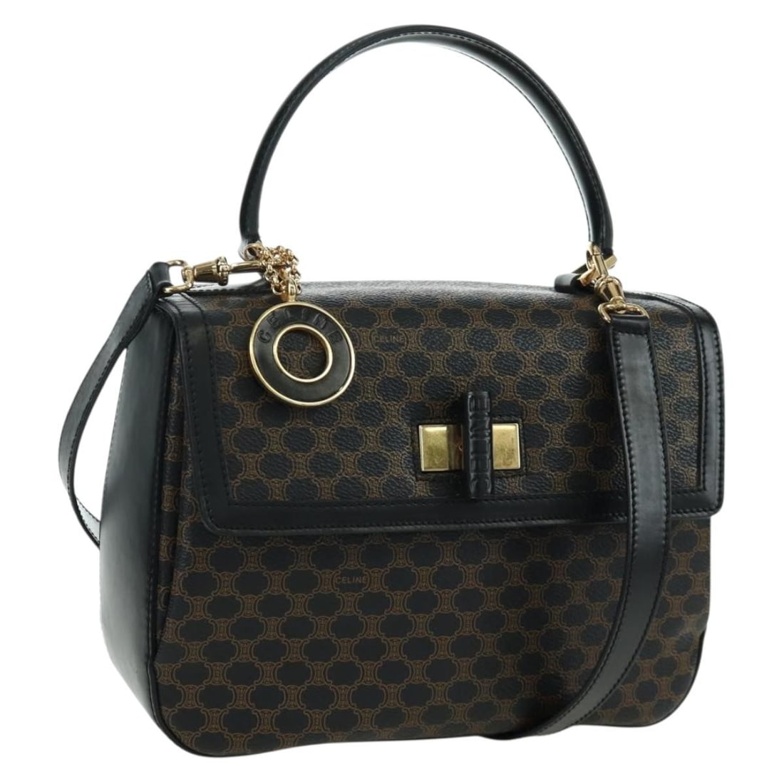 Celine Macadam Black PVC Canvas Circle Top Handle and Shoulder Bag: Celine Macadam Black PVC Canvas Circle Top Handle and Shoulder Bag This Celine Circle Macadam handbag is crafted from black and gold PVC leather and Macadam canvas. Designed for women, it features bot