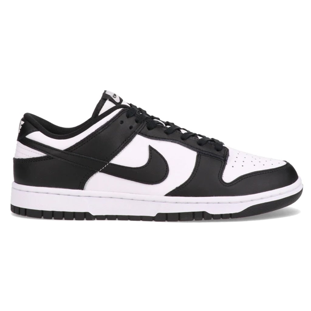 2022 Dunk Low Retro Black and White Sneakers by Nike: 2022 Dunk Low Retro Black and White Sneakers by Nike The Nike Dunk Low Retro White Black 2022 sneakers offer a timeless colorway with classic styling. These authentic shoes are un-used and in unworn c
