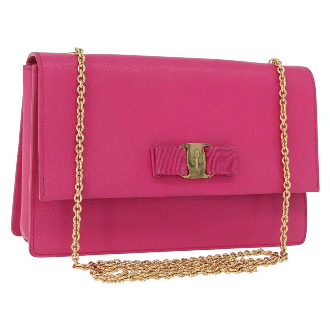 Pink Leather Vala Chain Shoulder Bag by Salvatore Ferragamo: Pink Leather Vala Chain Shoulder Bag by Salvatore Ferragamo This Salvatore Ferragamo Vala chain shoulder bag features a pink leather exterior with gold-tone accents. Designed for women, the bag includ