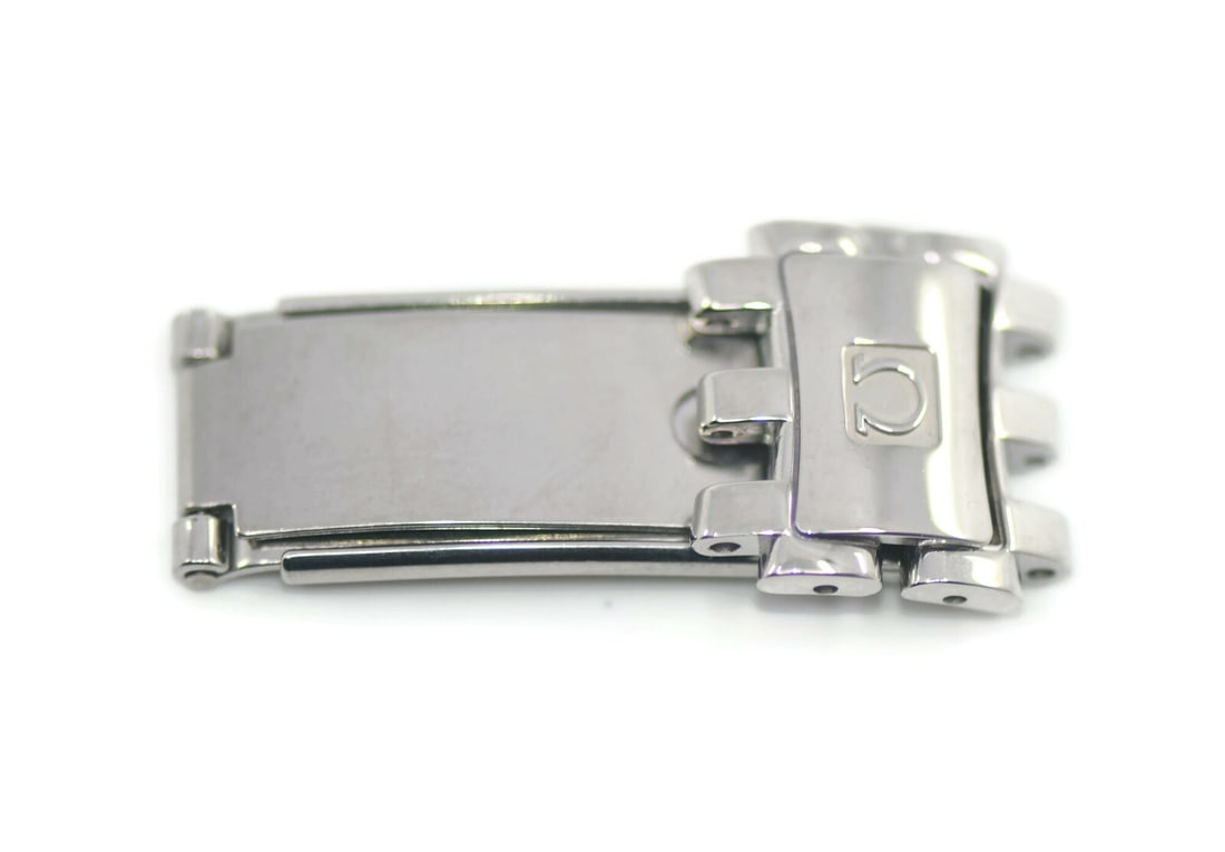 Omega Stainless Steel Wristwatch Band Buckle 16mm Authentic: Omega Stainless Steel Wristwatch Band Buckle 16mm Authentic This Omega wristwatch band features a durable stainless steel buckle with a band width of 16 mm, making it ideal for a secure and stylish fi