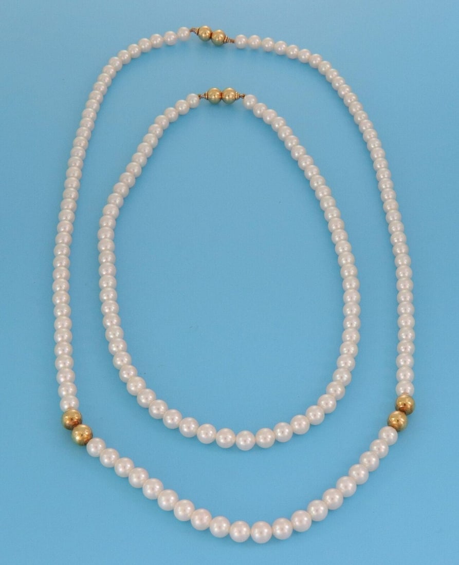 Detachable Mikimoto Pearl Necklace in 18k Yellow Gold Convertible Single Double Strand: Detachable Mikimoto Pearl Necklace in 18k Yellow Gold Convertible Single Double Strand This vintage Mikimoto necklace features high-quality pearls and 18k yellow gold in a versatile design. The neckla