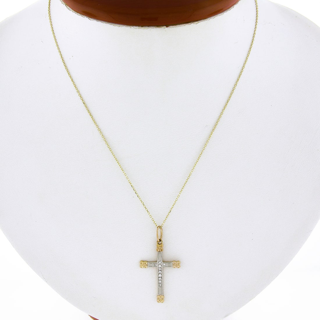 14k Two Tone Gold Pave Diamond Floral Cross Pendant Necklace: 14k Two Tone Gold Pave Diamond Floral Cross Pendant Necklace This exquisite vintage cross pendant necklace is crafted from solid 14k yellow and white gold, featuring a delightful floral design. The pe