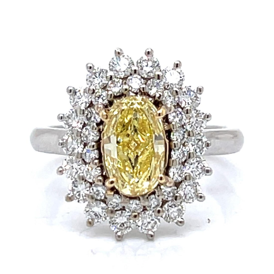 D. VATCHE 14K White Gold Fancy Yellow Diamond Ring GIA Certified 1.06 Ct: D. VATCHE 14K White Gold Fancy Yellow Diamond Ring GIA Certified 1.06 Ct Elevate your jewelry collection with this stunning D. VATCHE ring, crafted in 14K white gold. The centerpiece is a GIA Certifie