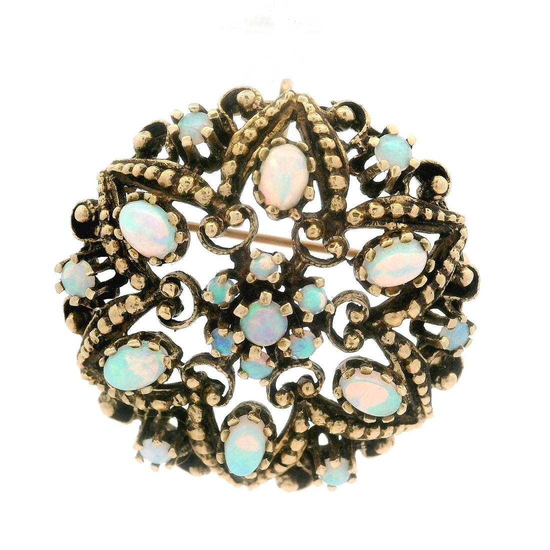Victorian Revival Yellow Gold Opal Cabochon Brooch Pin: Victorian Revival Yellow Gold Opal Cabochon Brooch Pin This exquisite vintage Victorian Revival brooch features a stunning array of natural opals, showcasing both round and oval cabochon cuts. The opa